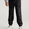 Calvin Klein Pantalon De Jogging Relaxed Avec Logo à Effet Phosphorescent -Pas Cher Calvin Klein Magasin IB0IB01896 0GJ main