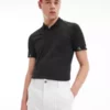 Calvin Klein Polo Slim Avec Logo Sur Les Poignets